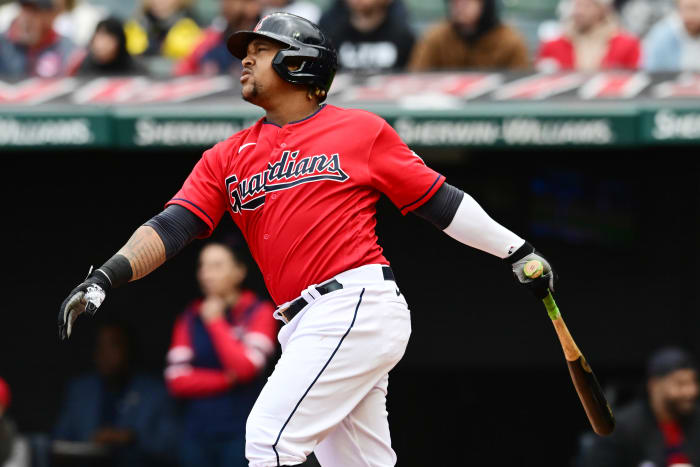 Apr 23, 2023; Cleveland, Ohio, USA; Cleveland Guardians third baseman Jose Ramirez (11) hits a home run during the third inning against the Miami Marlins at Progressive Field. Mandatory Credit: Ken Blaze-USA TODAY Sports